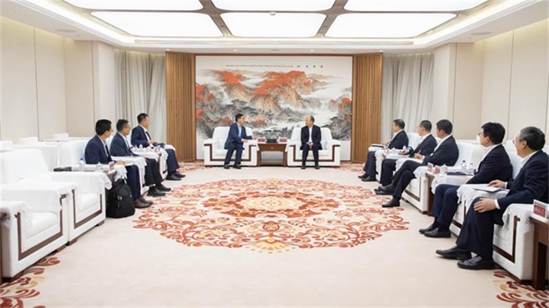 莫鼎革与福建能化集团党委书记、董事长徐建平会谈