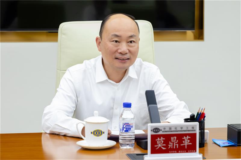 莫鼎革会见中国再保集团党委副书记、总裁庄乾志